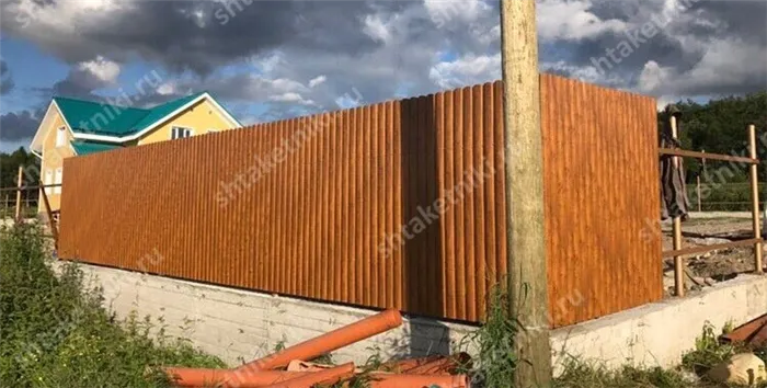 Двусторонний забор из э-дерева в Мурманске